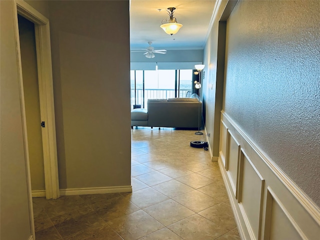 hallway with tile patterned floors