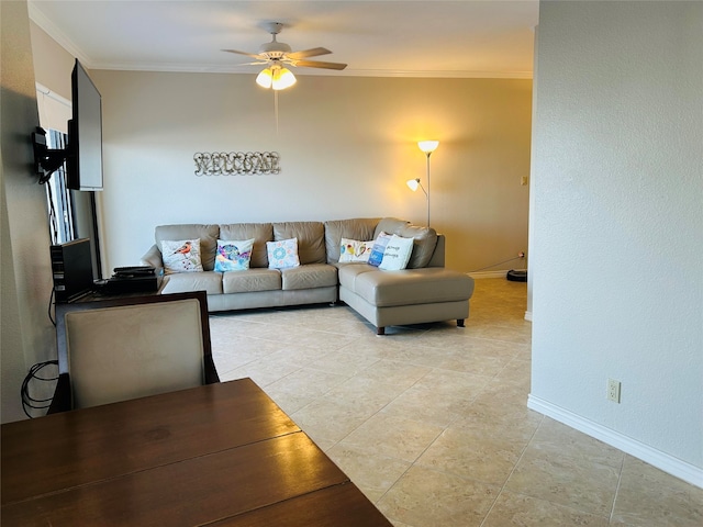 living room with ceiling fan, ornamental molding, and light tile patterned floors