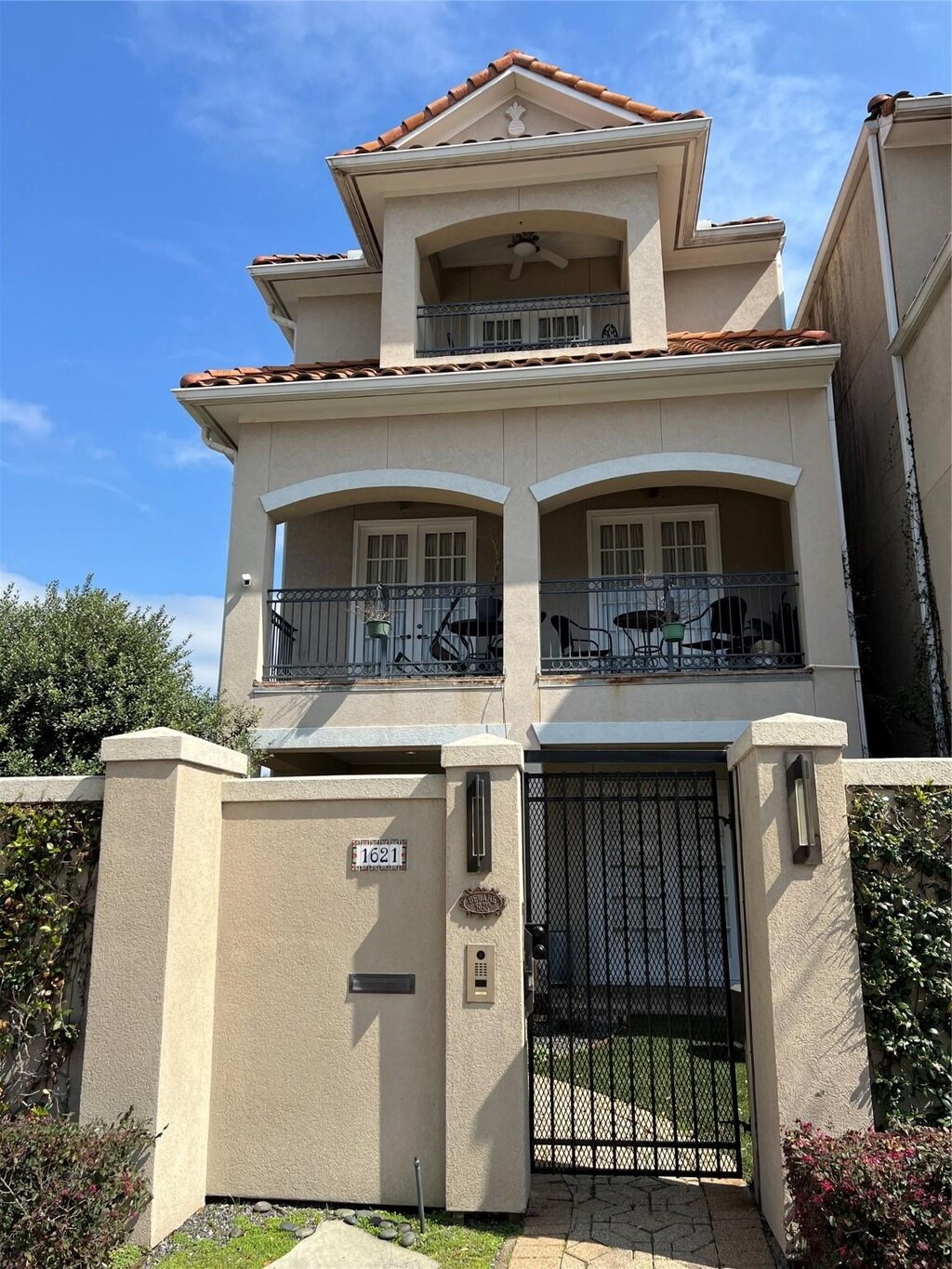 mediterranean / spanish home featuring a balcony