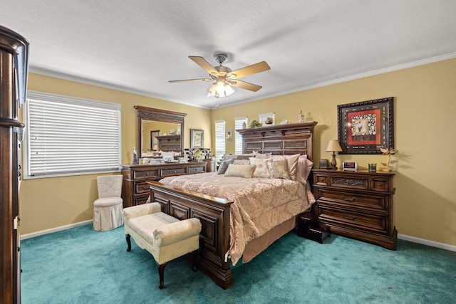 carpeted bedroom featuring ornamental molding and ceiling fan