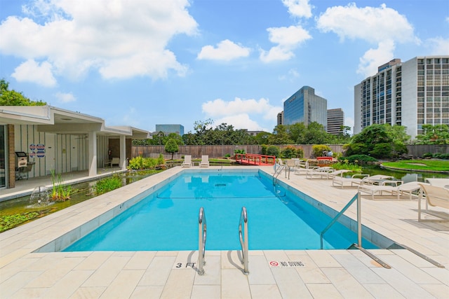 view of pool with a patio