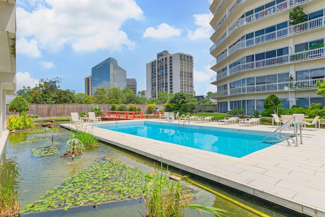 view of pool with a patio