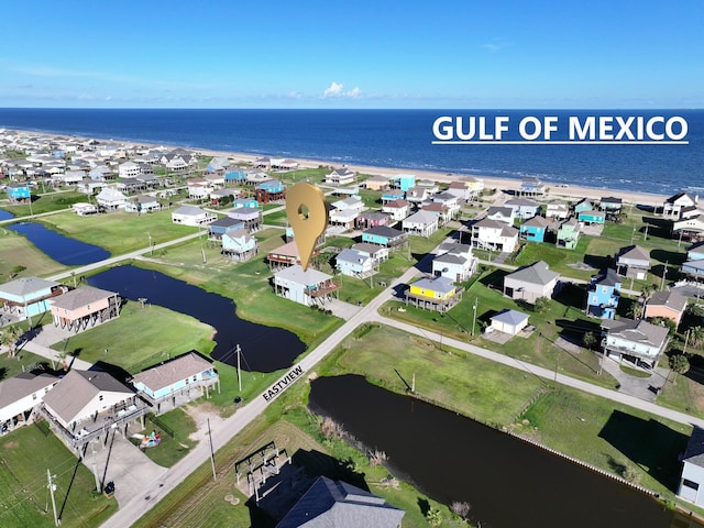 aerial view with a residential view and a water view