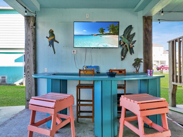 view of patio / terrace featuring exterior bar