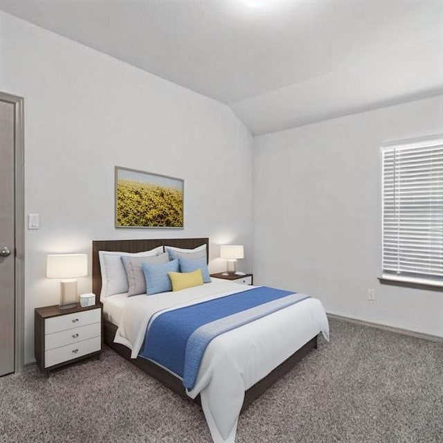 carpeted bedroom featuring vaulted ceiling