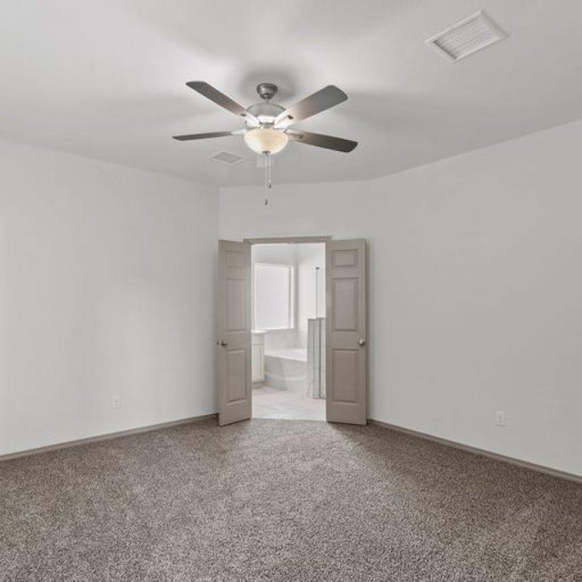 interior space featuring ceiling fan