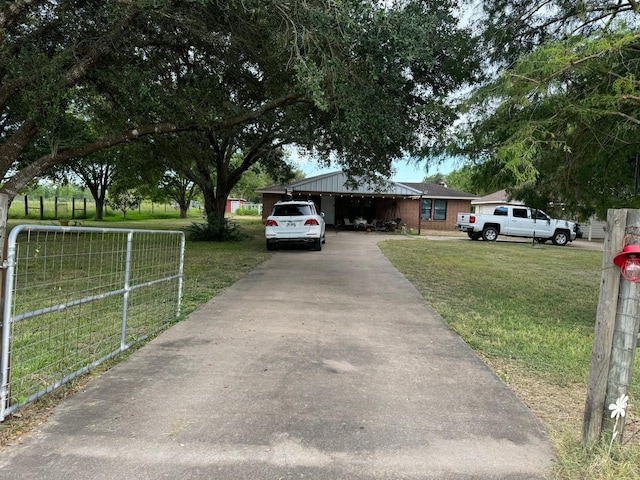 view of road with driveway