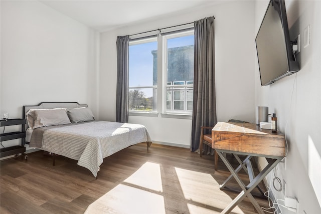 bedroom featuring hardwood / wood-style floors