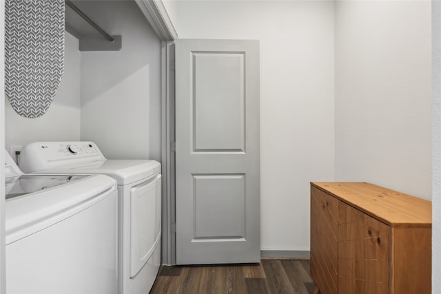 laundry area with dark hardwood / wood-style flooring and washing machine and clothes dryer