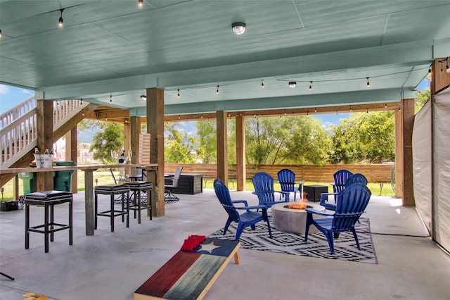 view of patio featuring a fire pit