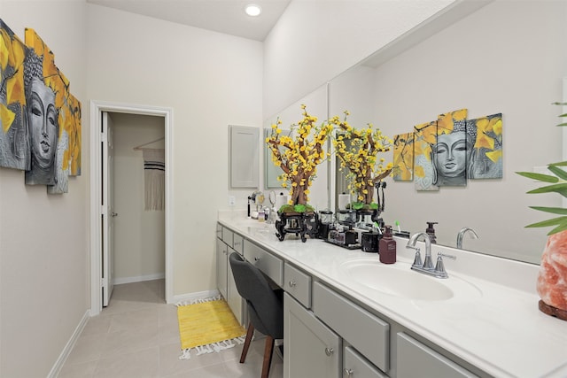 bathroom featuring tile patterned flooring and vanity