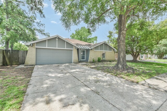 ranch-style house featuring a garage