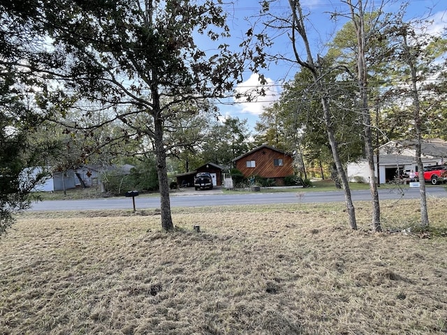 view of yard featuring a carport