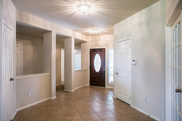 view of tiled entrance foyer