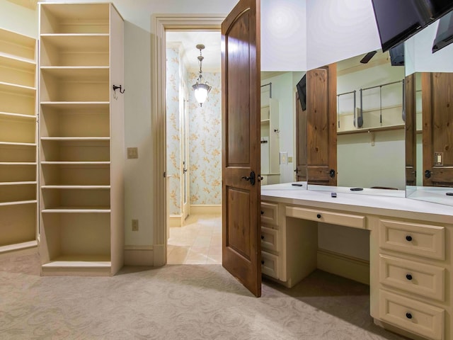 bathroom featuring baseboards and tile patterned floors