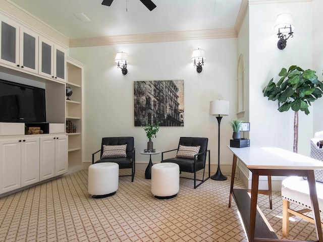 living room with arched walkways, crown molding, light colored carpet, a ceiling fan, and baseboards