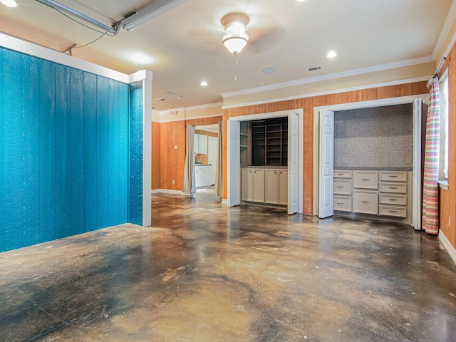 garage with recessed lighting and visible vents