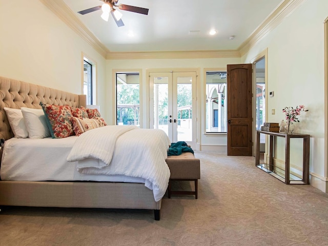 carpeted bedroom featuring ceiling fan, baseboards, access to exterior, ornamental molding, and french doors