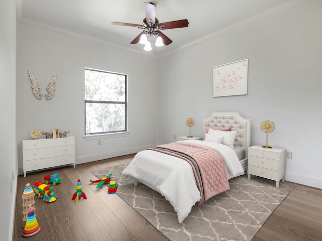 bedroom featuring ornamental molding, hardwood / wood-style floors, and ceiling fan