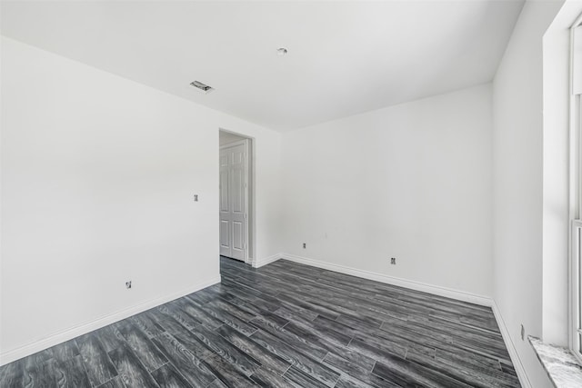 16518 Boston Post Rd, Cypress, TX 77429 - empty room featuring dark wood-type flooring and baseboards