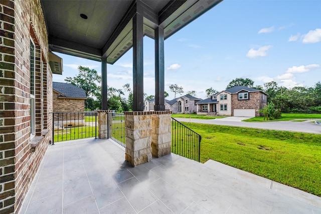 16518 Boston Post Rd, Cypress, TX 77429 - covered porch featuring a yard and a residential view