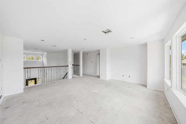 16518 Boston Post Rd, Cypress, TX 77429 - empty room featuring arched walkways and baseboards