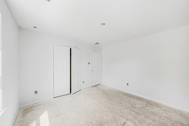 16518 Boston Post Rd, Cypress, TX 77429 - unfurnished bedroom featuring baseboards and a closet