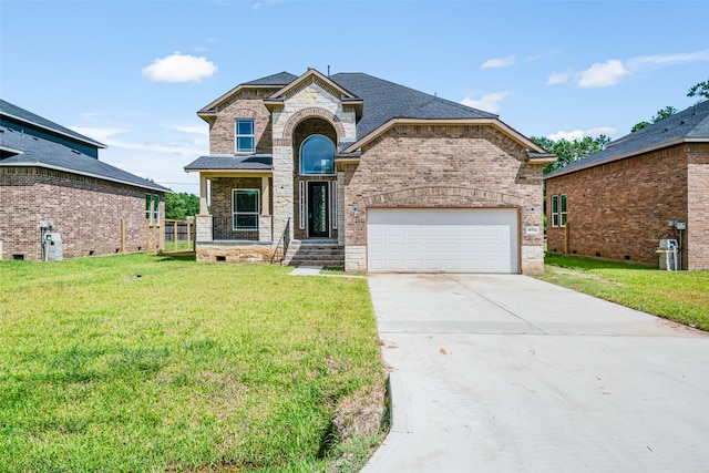 view of front facade with a front lawn and a garage