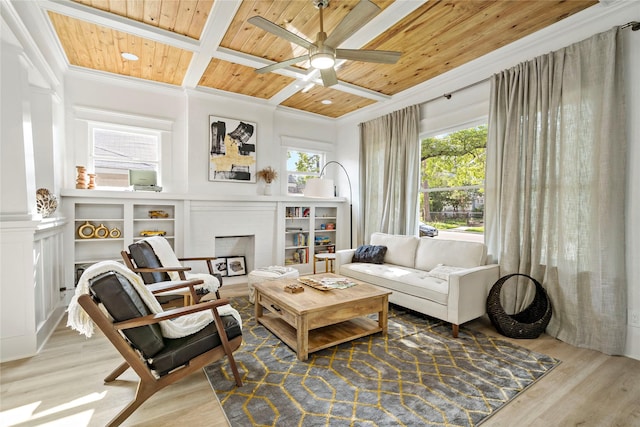 506 E Evergreen St, San Antonio, TX 78212 - living room with a wooden ceiling with exposed beams, wood finished floors, a ceiling fan, a fireplace, and crown molding