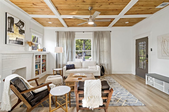 506 E Evergreen St, San Antonio, TX 78212 - living area with a wooden ceiling with exposed beams, a ceiling fan, coffered ceiling, wood finished floors, and ornamental molding