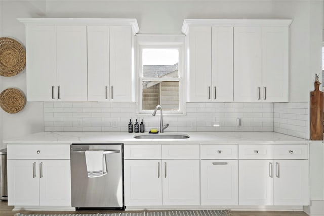 506 E Evergreen St, San Antonio, TX 78212 - kitchen with dishwasher, white cabinets, decorative backsplash, and light stone counters