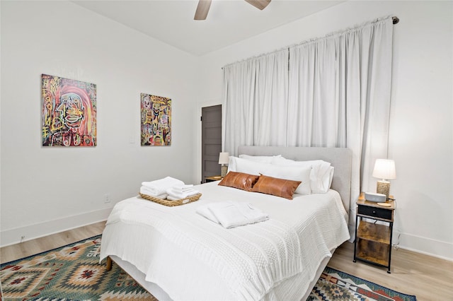 506 E Evergreen St, San Antonio, TX 78212 - bedroom with wood finished floors and ceiling fan