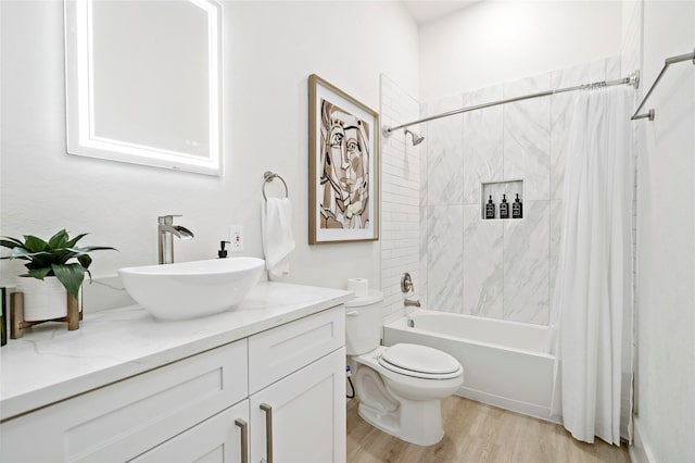 506 E Evergreen St, San Antonio, TX 78212 - bathroom with shower / bath combo with shower curtain, vanity, and wood finished floors