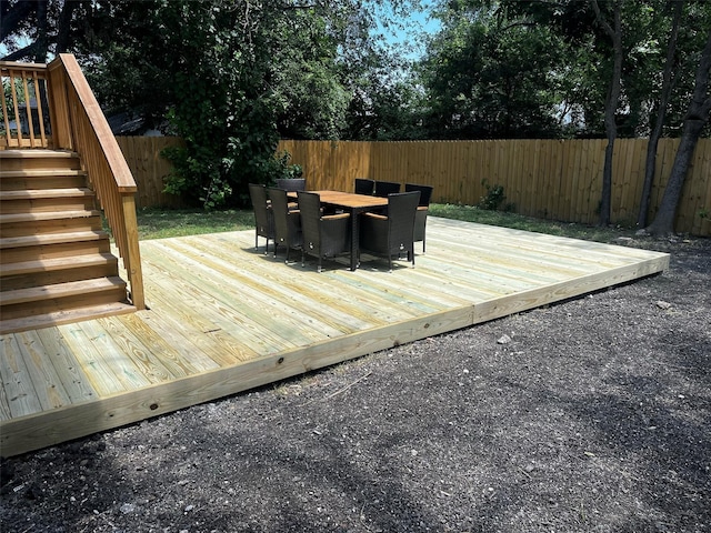 506 E Evergreen St, San Antonio, TX 78212 - wooden terrace with a fenced backyard, outdoor dining area, and stairway