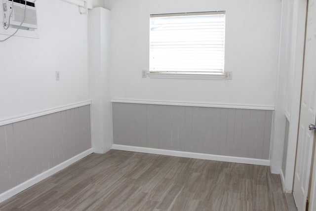 spare room featuring hardwood / wood-style floors