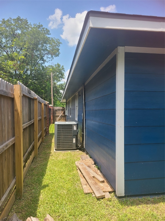 view of yard featuring central AC unit