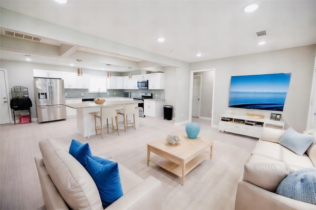 living room featuring light hardwood / wood-style floors