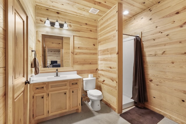 bathroom featuring curtained shower, wooden walls, vanity, wood ceiling, and toilet