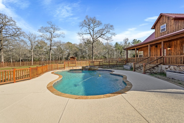 view of pool with a patio area