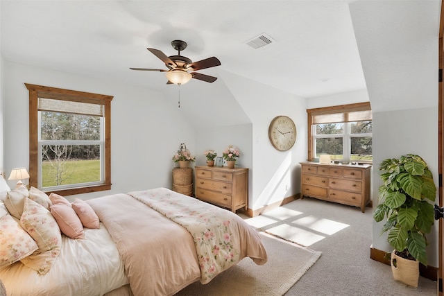 bedroom with light colored carpet and ceiling fan