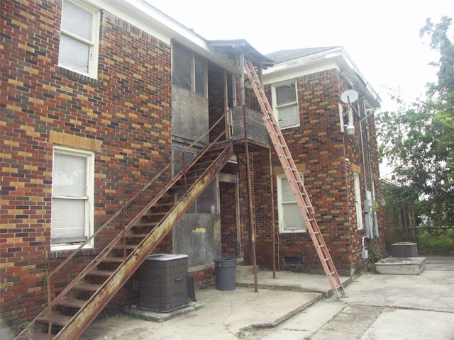 back of house featuring a patio and central AC