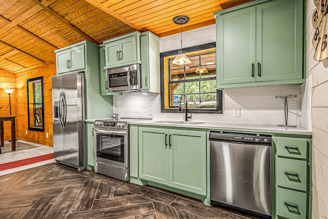 kitchen with wooden ceiling, dark parquet floors, sink, and stainless steel appliances