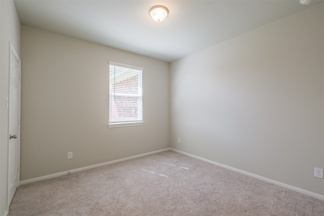 empty room with carpet flooring