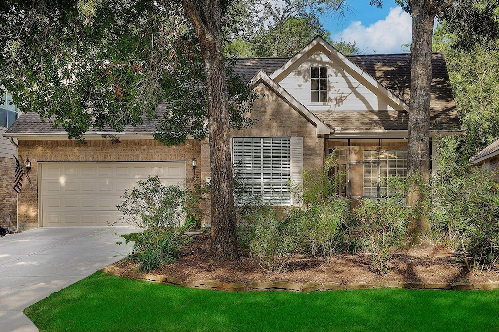 view of front of property with a garage