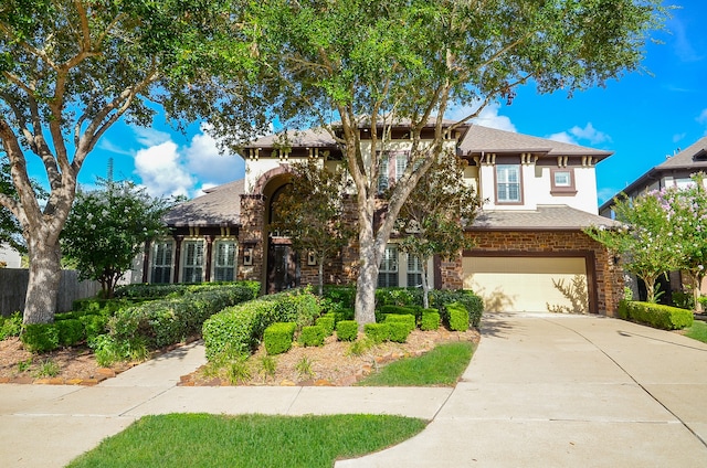 view of front of property featuring a garage