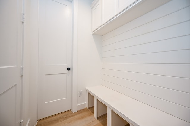 mudroom with light hardwood / wood-style flooring