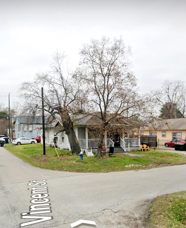 view of road with a residential view