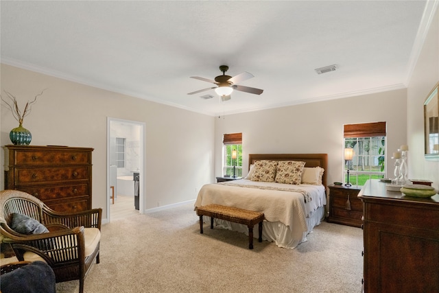 carpeted bedroom featuring ceiling fan, connected bathroom, and crown molding