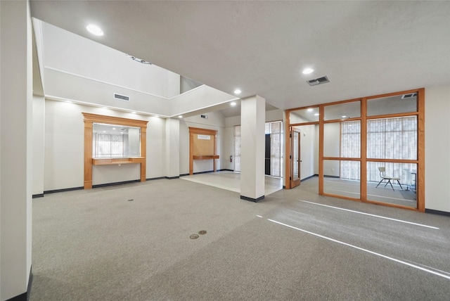 unfurnished room featuring baseboards, carpet flooring, visible vents, and recessed lighting