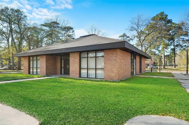 exterior space with a front yard